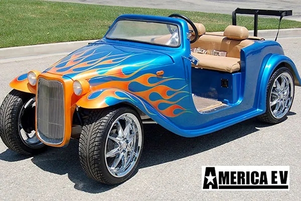 Blue California Roadster with Orange Flames affordable golf cart rental, golf cart rent bimini