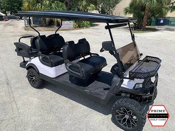 White Aluma 6 Passenger Lifted Golf Cart affordable golf cart rental, golf cart rent bimini